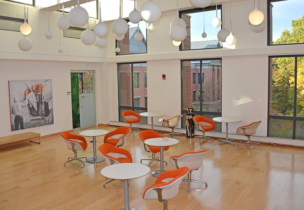 Modern office with orange chairs